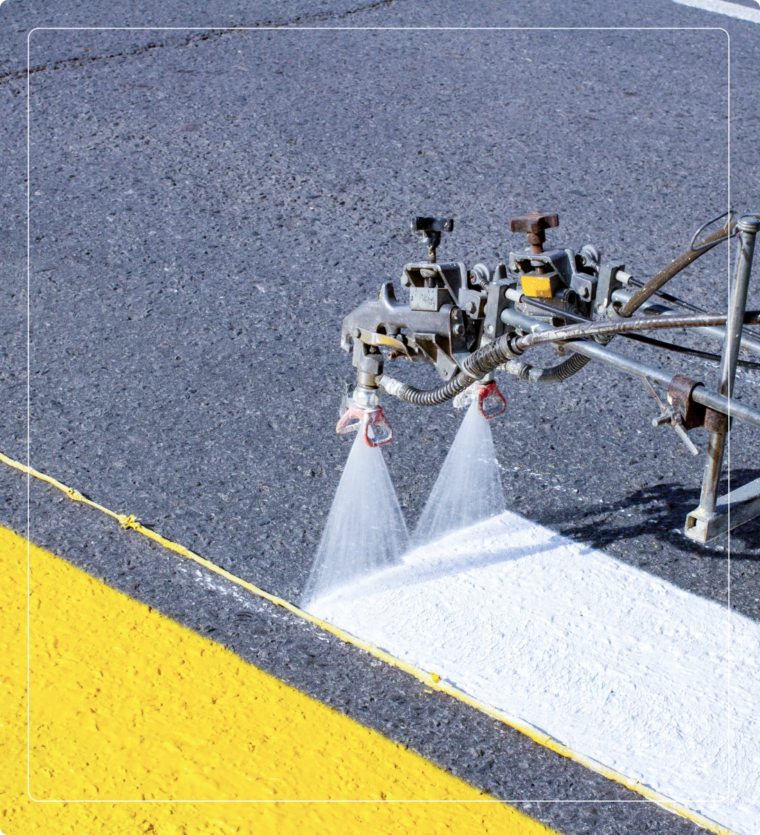 Road line painting machine in action